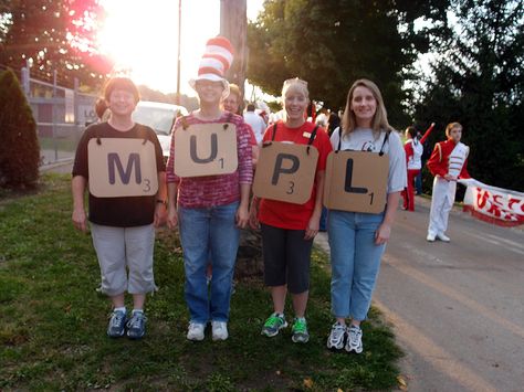 Homecoming parade participants... the library ladies! Theme is "board games"… Decade Parade Float Ideas, Scrabble Day Spirit Week, Board Game Spirit Week, Parade Ideas For Walking, Game Of Life Parade Float, Board Game Parade Float Ideas, Football Team Parade Float, Decade Homecoming Floats, Board Game Parade Float