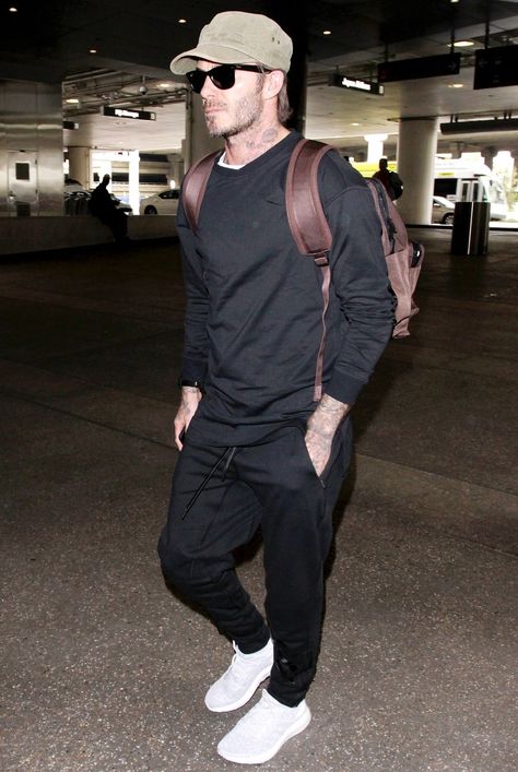 Cop the style legend's travel vibe for right around $500. Mens Airport Style, Airport Outfit Men, David Beckham Outfit, Men Athleisure, Men's Athleisure, David Beckham Style Outfits, Airport Outfit Comfy, Flight Outfit, David Beckham Style