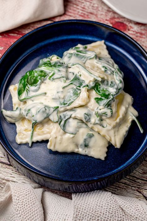 Discover the joys of fast and fabulous cooking with our 10-Minute Creamy Spinach & Cheese Ravioli. A simple yet elegant meal that combines garlic-infused cream cheese sauce with fresh spinach, enveloping each ravioli in a creamy, dreamy embrace. It's the perfect solution for a last-minute dinner that doesn't compromise on taste or quality. Microwave Chicken Recipes, Ravioli Sauce Recipe, Cheese Ravioli Recipe, Spinach And Cheese Ravioli, Spinach Casserole Recipes, Pressure Cooker Recipes Chicken, Cream Cheese Spinach, Spinach Ravioli, Creamy Pasta Sauce