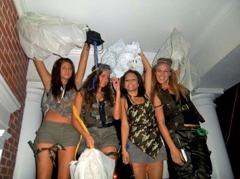 America Party. Homemade Paratrooper Costumes with Parachute. Camo clothes, army tools from dollarstore halloween costumes, vinyl table cloth and string. tie the string to the parachute and then stuff it into the bag. Camo Frat Party Outfit, Camping Theme Party Outfit, Camo Themed Party, Jungle Frat Party Outfit, Camo Dress Up Day At School, Army Costume Halloween, Camo Theme Outfit, Camo Party Outfit, Camo Outfits Spirit Week