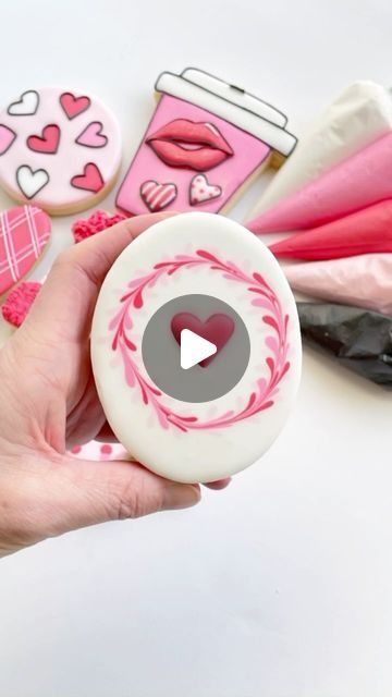 Victoria Jones | Decorated Sugar Cookies | Keller, TX on Instagram: "A Valentine’s-themed wet on wet wreath cookie using a special heart-shaped royal icing transfer! Simple beauty😍 ❤️Curious about how to make these for your loved ones? 📣Comment “transfers” below for details on my Valentine’s royal icing transfer templates, OR my online Valentine’s cookie decorating classes to become a cookie decorating pro just in time for Valentine’s Day! #valentinesdaycookies #wetonwetcookies #royalicingtransfers #decoratedsugarcookies #cookiedecorating #cookieclass #cookiedecoratingvideo #cookiedecorator #cookieart #bemyvalentine #foodart #edibleart #dfwcookies #fortworthcookies" Heart Sugar Cookies Decorated, Heart Royal Icing Cookies, Valentines Day Sugar Cookies, Heart Sugar Cookie, Wreath Cookies, Valentine Sugar Cookies, Royal Icing Transfers, Sugar Cookie Royal Icing, Valentines Day Cookies