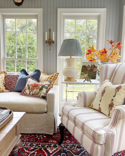 Hello and welcome to the sun room in her new color! This beautiful bold and bright colored rug from @suzanne.the.rug.dealer was begging… | Instagram Transitional With Pops Of Color, Colourful Cottage Living Room, Colorful Cottage Interiors Living Room, Open Concept Home Decor, Mixed Patterns Living Room, Homes With Color, Pretty Sunrooms, Colorful Cozy Home, Granny Living Room