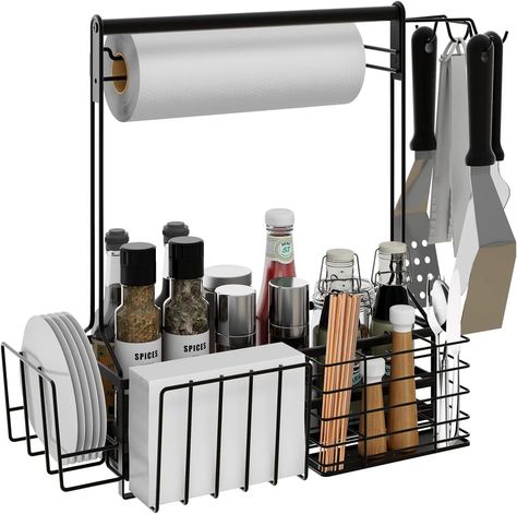 This silverware holder consists of a paper towel roll holder, 4 hooks, a napkin holder and plates holder . The logical partition design makes it easier to store paper plates, dishes, forks, spoons, knives, napkins, condiments, grill tools, and other supplies, ideal for a cutlery caddy. It can hold everything you need for your barbecue, camping, tailgating. Bbq Gift Ideas, Grill Caddy, Outdoor Must Haves, Camper Storage Ideas Travel Trailers, Amazon Camping, Camper Storage Ideas, Cutlery Caddy, Amazon Gadget, Barbecue Camping