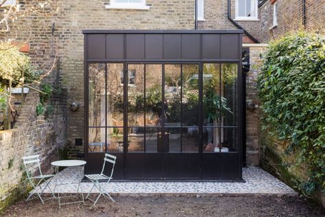 A Combination of Styles and Color in a London Townhouse 27 London Terrace House, Conservatory Living Room, Concrete Island, Black Hexagon Tile, Kitchen Bay Window, Small Sitting Area, Modern Black Kitchen, Open Plan Kitchen Dining Living, Built In Dresser