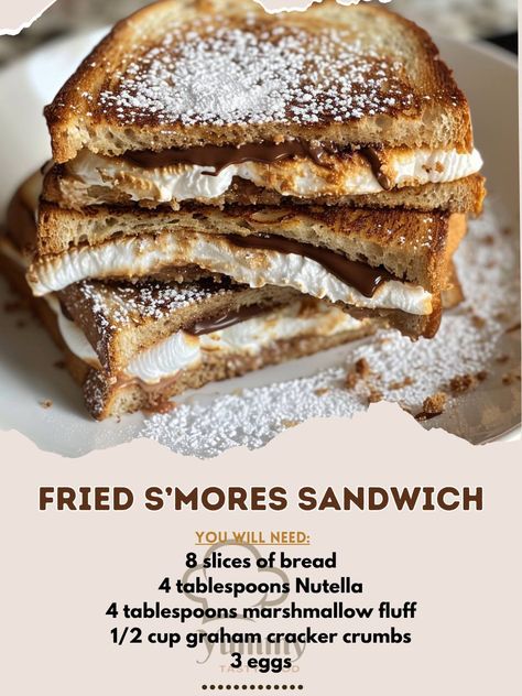 🍫🍞 Dive into decadence with our Fried S’mores Sandwich—gooey, chocolatey, and irresistible! #SmoreFun #DessertTime 🍽️ Fried S’mores Sandwich 🛒 Ingredients: 8 slices of bread 4 tablespoons Nutella 4 tablespoons marshmallow fluff 1/2 cup graham cracker crumbs 3 eggs, beaten Butter for frying Powdered sugar for dusting 👩‍🍳 Instructions: Spread: Nutella on 4 slices, marshmallow fluff on 4 slices, sprinkle with graham cracker crumbs. Assemble: Make sandwiches with the bread. Dip: Coat in beate... Nutella Sandwich, Bread Dip, Sandwich Ingredients, Homemade Sweets, 3 Eggs, Marshmallow Fluff, Graham Cracker Crumbs, Graham Cracker, Slice Of Bread