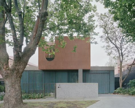 A Brick Facade Is About All This Australian Home Shares With Its Neighbors - Dwell Brick Siding, Timber Battens, Polished Plaster, Street Trees, Internal Courtyard, Metal Siding, Dappled Light, Stone Siding, Curved Staircase