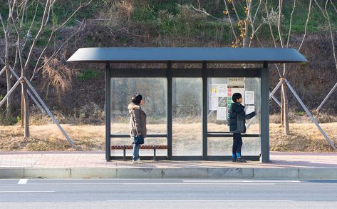 Unit-design created the bus stop installations as part of a comprehensive street furniture system for Paju in South Korea, which became a city in 1997. unit-design worked on this project in cooperation with internationally renowned Korean designer Ahn Sang-Soo, Dutch design firm Studio Dumbar, which was responsible for the corporate design, and Hongik University, Seoul. Korean Bus Stop, Japanese Bus Stop, Bicycle Parking Design, Studio Dumbar, Hongik University, Bus Stop Design, Urban Furniture Design, Urban Design Architecture, Bus Shelters