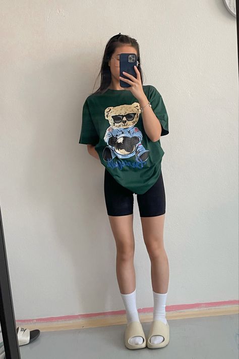 ootd, yeezy slides, biker shorts, white socks, airport fit, oversize t-shirt Spandex Shorts With Big Shirt, Airport Outfit Slides, Biker Shorts Airport Outfit, Summer Fits Biker Shorts, Workout Outfits Baggy Shirt, Shirt And Cycling Shorts Outfit, Large Shirt Biker Shorts Outfit, Biker Shorts Big Tee Outfit, T Shirt And Biker Shorts Outfit