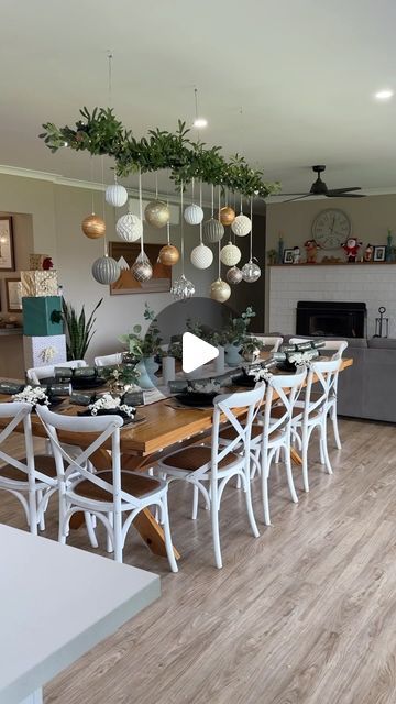 Jade Compston - Refinish With Jade on Instagram: "✨DIY Hanging Garland ✨

Transform your dining space with this beautiful DIY hanging garland made with supplies from @Bunnings! Here’s how I did it 👇

🌟 Step 1: Grab wall anchors and hooks from Bunnings. Attach the hooks to the ceiling above the table, spacing them evenly, and use picture hanging wire to hang from the hooks.

🌟 Step 2: Take wire battery lights and wrap them around a stick. Attach the stick to the wire strings hanging from the ceiling.

🌟 Step 3: Choose your colour scheme and start hanging Bunnings decorations using different ribbons, making sure to hang them at varying heights.

🌟 Step 4: Continue decorating until the stick is full. Start with large decorations, then fill in the gaps with smaller ones.

🌟 Step 5: For a Christmas Decoration Hanging Over Table, Hanging Bauble Decoration Ideas, Above Table Christmas Decorations, Garland With Hanging Ornaments, Over Table Hanging Decorations Christmas, Hanging Baubles Ceiling, Christmas Decor Ideas Hanging, Over Table Hanging Decorations, Christmas Hanging Decorations Ceilings