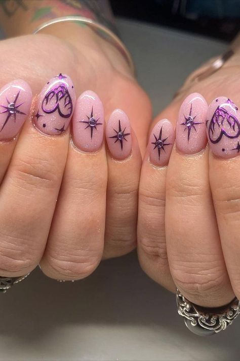 These sweet, girly chrome fall nails by @nailsbloodynails (IG) feature a pink glitter base with a soft purple chrome finish. Adorned with delicate star and heart nail art, the design creates a dreamy, whimsical vibe perfect for adding a touch of sparkle and charm to your autumn look. Discover the season's trendiest chrome fall nail designs and elevate your manicure game. From warm autumn tones to bold metallics, these 25 chrome-inspired nail ideas are perfect for your fall look! Bratz Inspired Nails, Chrome Fall Nails, Chrome Nail Ideas, Fall Nail Design, Autumn Tones, Celebrity Nails, Heart Nail Art, Nail Design Ideas, Star Nails