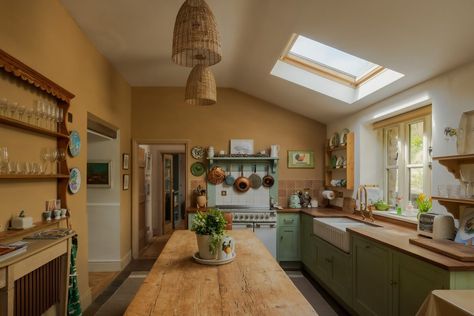 Ochre Yellow and Green Tones in a Cozy Welsh Cottage 1 Yellow Kitchen Designs, Cozy English Cottage, Welsh Cottage, Yellow Cabinets, Airbnb Design, Ochre Yellow, Sleek Kitchen, Stone Cottage, Yellow Kitchen