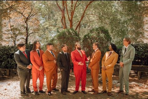 Mixed Color Groomsmen Suits, Autumn Groomsmen Color Schemes, Different Color Groomsmen Suits, Groomsmen Colorful, Eclectic Groomsmen Attire, Multi Color Groomsmen Attire, 70s Groomsmen Attire, Sunset Groomsmen Attire, Groomsmen Attire Colorful