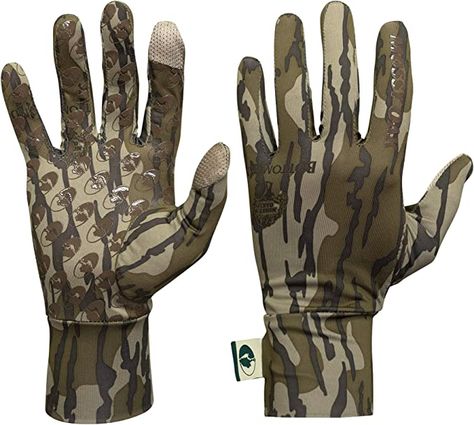 VERSATILITY: Ideal for warm weather hunts during turkey, deer, and big game seasons. These camoflauge gloves make the perfect archery hunting gloves and double as a layering glove in colder weather. MOSSY OAK CAMO: These gloves are available in a variety of camo patterns such as Break-Up Country, Obsession, Bottomland, or Vintage camo patterns like Original Bottomland, Greenleaf, and Original Treestand. Hunting Gloves, Sporting Goods Store, Soft Gloves, Fleece Gloves, Camouflage Design, Mossy Oak Camo, Tactical Gloves, Camo Patterns, Turkey Hunting