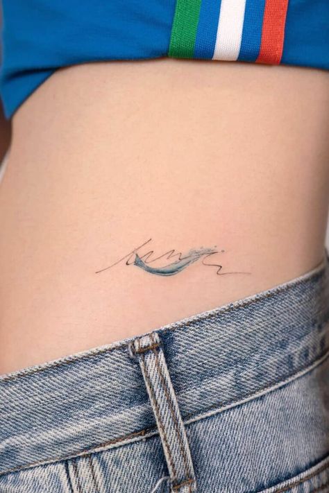 32 Magnificent Wave Tattoo Designs Single Line Ocean Tattoo, Beach Waves Tattoo Ideas, Small Water Tattoo Ideas, Wave Flower Tattoo, Ocean Beach Tattoo, Small Wave Tattoos For Women, Beach Wave Tattoo Ideas, Ocean Wave Tattoos For Women, Blue Wave Tattoo