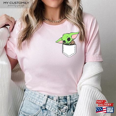 Pocket Baby Yoda Shirts Starwars Disney Classic Unisex Check more at https://mycustomily.com/product/pocket-baby-yoda-shirts-starwars-disney-classic-unisex/ Yoda Shirt, Star Wars, Disney