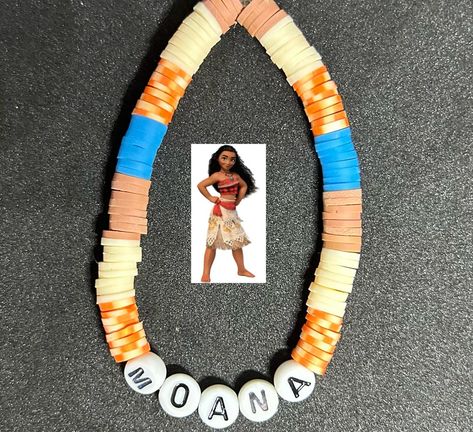 Moana (Disney Princess) Heishi Bracelet #handmadebracelet #heishibracelets #beadedbracelets #bracelets #personalizedbracelets #personalizedbracelet #disneyprincesses #disneyprincess #cinderella #disneyprincessbracelet #moanadisney #moanacosplay #moanabracelets #moanabracelet Disney Clay Bracelet Ideas, Moana Bracelet Ideas, Disney Bracelet Ideas Clay Beads, Princess Clay Bead Bracelet, Moana Beaded Bracelet, Moana Bracelet, Disneyland Beaded Bracelet, Disney Themed Beaded Bracelet, Moana Cosplay