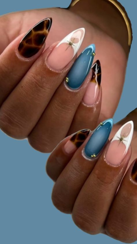 #trendingnails #naildesign #nailart #nails #almond #stiletto #inspo #nailinspo #gemstones #gems # turquoise #blue #babyblue #lightblue #brown #white #gold #leopard #leoprint #white Almond Stiletto, Blue And White Nails, Turquoise Nails, Leopard Nails, Nails Almond, Gold Nails, Stiletto Nails, Blue Nails, White Nails