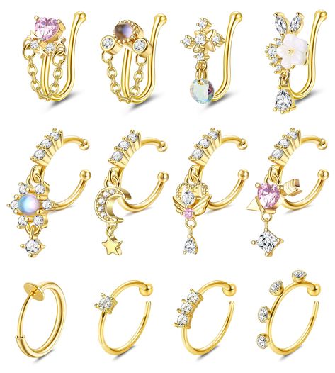 PRICES MAY VARY. ⭐[Affordable Nose Ring Set]: An order includes 4pcs U-shaped dangle fake nose rings and 8pcs nose hoop rings. Basic nose cuff and novel CZ dangle nose hoop ring combination. Nose rings styles are diverse, and different styles give you a different wearing experience. 🌜[Adjustable Design]: The nose ring has an adjustable opening design, which is easy to bend and is well adjusted. Each of nose cuff can be slightly adjusted to fit different nose sizes, suitable for most people. The Clip On Nose Ring, Jewelry 2024, Fake Nose Ring, Nose Cuff, Nose Ring Hoop, Tragus Ring, Fake Nose Rings, Opening Design, Fake Nose