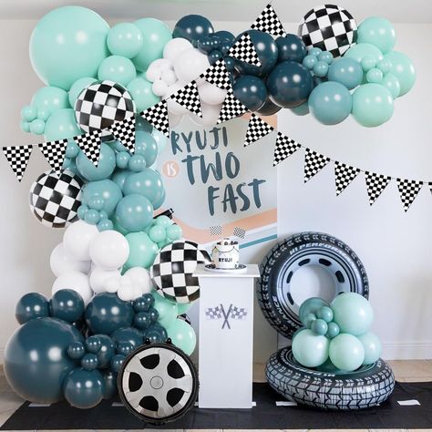 PRICES MAY VARY. 【Race Car Balloons Arch】: This comprehensive set includes various sizes and colors of balloons: 2pcs 18" balloons, 20pcs 12" balloons, 80pcs 10" balloons, and 40pcs 5" balloons. Colors include peacock blue, dusty blue, teal blue, and white. The kit also includes 4 checkered 18-inch balloons, 1 large wheel foil balloon, 1 medium wheel foil balloon, and a 3-meter checkered flag banner, plus a 3-piece accessory set (glue dots, ribbons, chains). 【Widely Applicable】 This race car bal Vertical Balloon Garland, 2nd Birthday Party For Boys Themes, Cars 3rd Birthday Party, Blue And White Balloons, Two Fast Birthday Party, Luca Party, Car Balloon, Vintage Race Car Party, Race Car Party Decorations