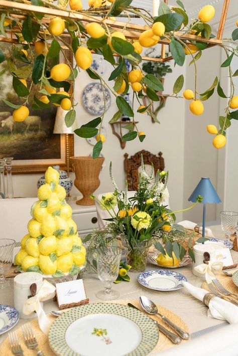 A lemon blue and white tablescape party - Italian Amalfi Coast. See how I set the table and hung faux lemon branches off the chandelier! Italian Theme Decor, Amalfi Coast Decor, Amalfi Coast Theme Party, White Tablescape, Lemon Centerpieces, Italy Decor, All About Italy, Italian Theme, Lemonade Party