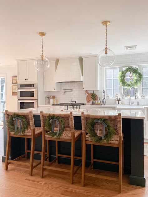 Holiday kitchen, navy island Wreath In Kitchen, Lit Trees, Modern Coastal Kitchen, Pine Swag, Winter Swag, Winter Garland, Porch Windows, Classic Window, Window Candles