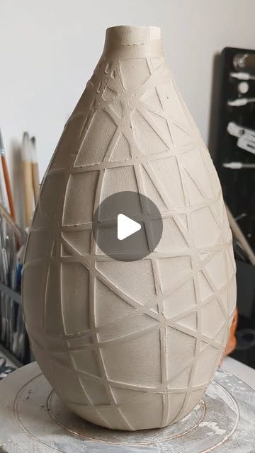 Rhita Lamtahri on Instagram: "Technique du ruban adhésif sur un grand vase 🤩 #ceramic #pottery #art #rhitalamtahri" Vase Design Ideas, Ceramic Pottery Art, Pottery Texture, Clay Carving, Carved Pottery, Clay Videos, Ceramic Wall Hanging, Pottery Vases, Ceramic Art Sculpture