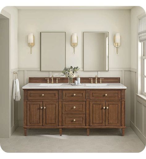 The 71 7/8" Lorelai Double Vanity celebrates timeless form and exquisite finish details, combined with practical function. The beauty of the natural grains in the walnut veneer is accented by reeded details, and clean, raised picture frame molding. The decorative, coin-edge knobs in Champagne Brass provide the perfect complement to the Mid-Century Walnut finish. This four-door cabinet opens to spacious interior with shelves and convenient USB/Electric power outlets. Three traditional drawers and Extra Long Double Vanity, Bathroom Storage Vanity, Wood Vanity With Gold Hardware, Vintage Sink Vanity, Bathroom Remodel With Storage, Cherry Cabinet Bathroom Ideas, Split Bathroom Vanity Master Bath, Wood Wainscoting Bathroom, Primary Bathroom Vanity