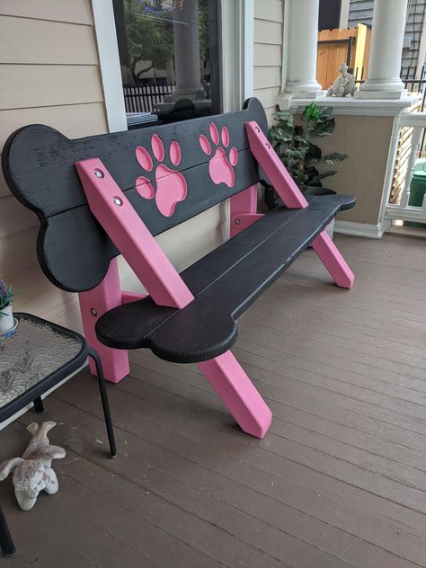 The Puppy Scapes Bench is made of pressure treated pine wood for exterior use and rated for ground contact, so it can handle extreme rain and sun. Feature: with Paw Print Backrest Product Measurements: 6 “ long Dog Room Design, Dog Boarding Ideas, Indoor Dog Park, Dog Boarding Facility, Pet Store Ideas, Dog Grooming Shop, Outdoor Dog House, Dog Bench, Landscaping Diy