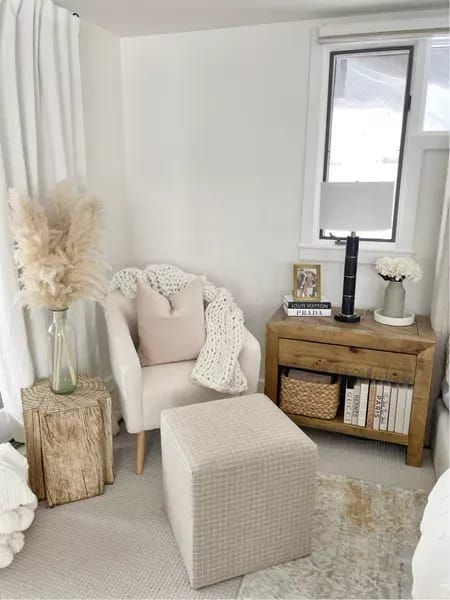 MASTER BEDROOM \ I had an empty space in my room that was calling to me, so I decided to create a cozy corner. It’s the perfect place to snuggle up and read a book! I found this sherpa barrel chair, paired it with a square pouf, rustic side table, my go-to pampas grass, a knit throw and a velvet pillow from my bed to tie it all together. Create a cozy corner for less this new | SBK Living Chair And Side Table Corner, Love Seat In Bedroom Cozy Corner, Bedroom Sofa Chair Cozy Corner, Bedroom Sitting Area Small Cozy Corner Aesthetic, Small Snug Room Ideas Cozy Nook, Empty Space In Bedroom, Reading Corner Diy, Reading Corner Bedroom Small Spaces, Chair In Bedroom Corner