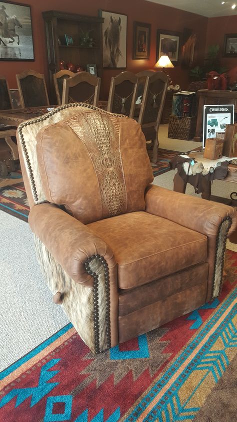 Rustic comfort! This recliner rocks and swivels! Distressed top grain leather with genuine cowhide on the sides and front arm posts.  And let's not forget the copper croc embossed leather down the middle of the seat back cushion! Brown Recliner, Western Ideas, Rustic Comforter, Swivel Rocker Recliner Chair, Distressed Top, Leather Recliner Chair, Western Furniture, Mountain Style, Mountain High