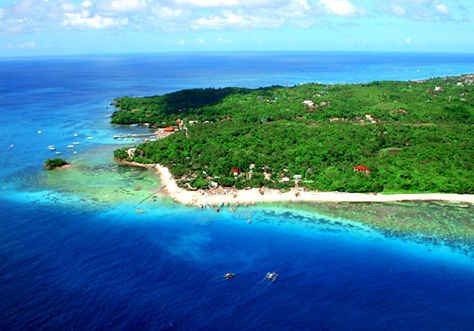 Manoc-Manoc Beach--The southernmost beach and village, Manoc-Manoc Beach (translated as Chicken-Chicken) creates a spectacular view of the Caticlan channel, the westernmost tip of Panay Island. This usually deserted and quiet beach is a good place for swimming and photographing images with the dark blue mountains and crystal clear waters materializing into an ultimate surreal panorama. The beach is windy the whole year Panay Island, Quiet Beach, Blue Mountain, Crystal Clear Water, Beautiful Islands, Water, Travel