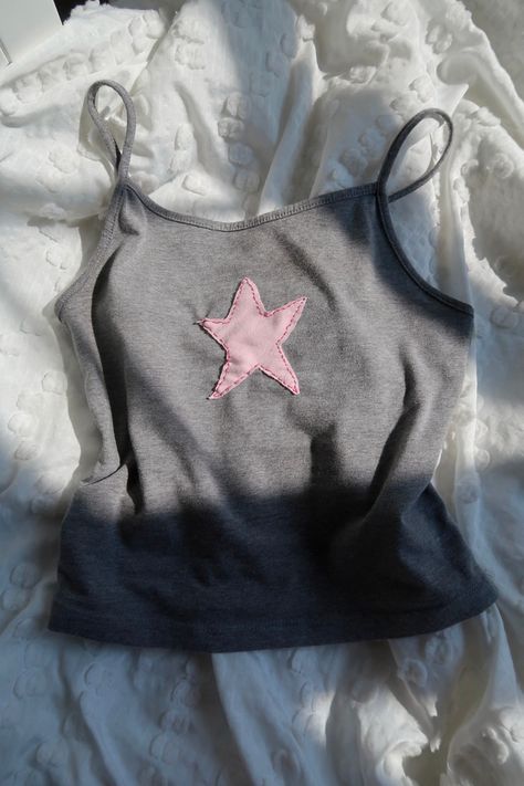 Adorable pink star patch tank! The star is hand sewn onto the tank and recyled from shorts I had in the back of my closet! This top is the perfect addition to your wardrobe. All of our clothing items are freshly laundered and to maintain your tank, wash on a gentle cycle and hang to dry. Patches Clothes Ideas, Hand Sewed Clothes, Button Ideas Clothes, Homemade Tops For Women, Upcycle Tank Top Diy, Birthday Sewing Projects, Patchwork Tank Top Diy, Stiching Ideas Top, Clothes Diy Aesthetic