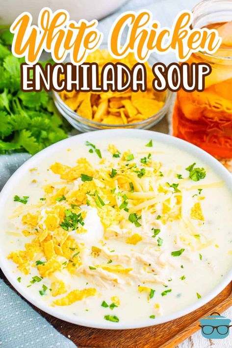 A large Dutch oven with White Chicken Enchilada Soup. White Bean Chicken Enchilada Soup, Progresso Chicken Cheese Enchilada Soup Recipes, White Chicken Enchiladas Soup, Green Enchilada Chicken Soup Crock Pot, Chicken Cheese Enchilada Soup, White Chicken Enchilada Soup Crock Pot, White Chicken Tortilla Soup Crock Pot, White Tortilla Soup, Creamy Enchilada Soup Crockpot