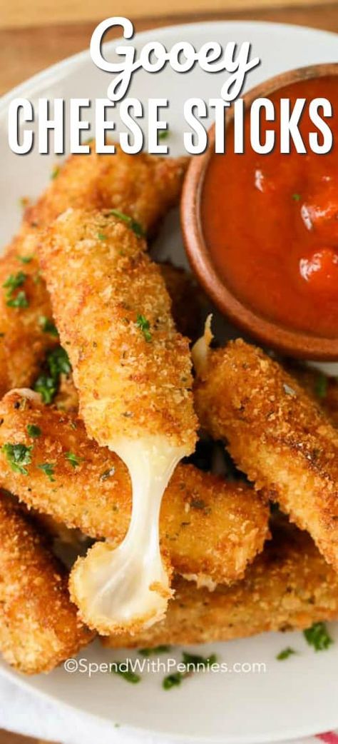 These easy cheese sticks are the best appetizer ever. Serve them alongside some marinara sauce for mozzarella sticks that everyone will devour! #spendwithpennies #cheesesticks #mozzarellasticks #cheesy #appetizers #cheesysticks #mozzasticks Sauce For Mozzarella Sticks, Easy Cheese Sticks, Homemade Cheese Sticks, Cheesy Appetizers, Fried Cheese Sticks, Best Appetizers Ever, Homemade Mozzarella Sticks, Best Appetizer, Mozzarella Cheese Sticks