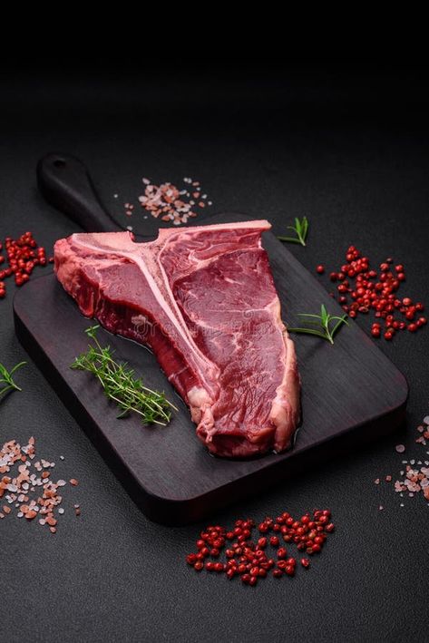 Raw juicy beef t-bone steak with salt, spices and herbs royalty free stock photography Meat Photoshoot, Textured Concrete, Concrete Background, T Bone Steak, Hype House, T Bone, Spices And Herbs, Stock Photography Free, Stock Photography