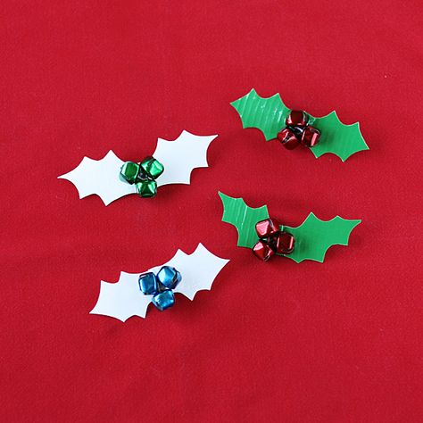 Holly berries aren’t just for Christmas you know. They are a wintertime symbol and these brooches, made from duct tape and jingle bells, would be perfect to wear on New Year’s Eve! Duct Tape Holly Berry Pins Instead of pins, you can make these into festive magnets! Simple attach a magnet to the back insteadRead More » Bell Crafts, Mistletoe Gift, Crafts By Season, Duct Tape Crafts, Awesome Crafts, Yule Ball, Rose Cupcakes, Gift Wraps, Clothes Pin Crafts