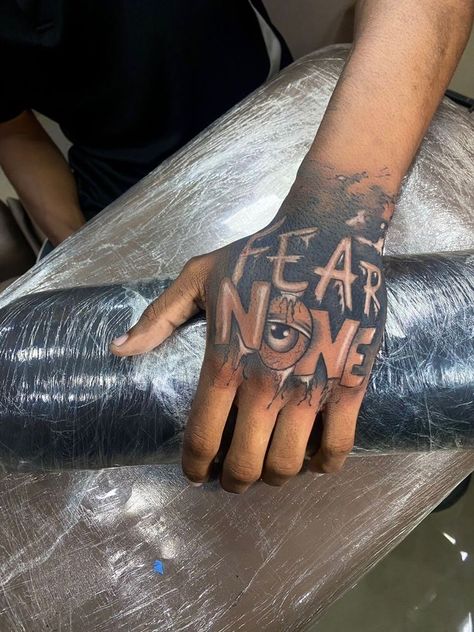 Hand Tattoos For Guys Cover Up, Mob Tattoo For Men, Men Trap Tattoo, The World Is Yours Hand Tattoo, Trap Tattoos Men Hand, Hand Tattoos Black Man, Hand Tattoo Stencils For Men, Neck And Throat Tattoos Men Hood, Top Of Hand Tattoos Men