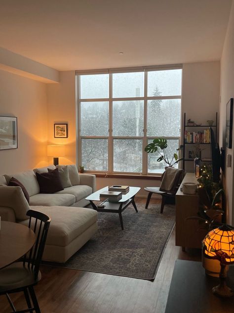 Apartment Living Room Big Windows, Apartment Dark Wood Floors, Open Layout Apartment Decor, Cozy Nyc Apartment Living Room, Home Decor Gray Floors, Cozy First Home, Minimalist Apartment Dark, 100 Sq Ft Living Room, Galley Kitchen Living Room Combo