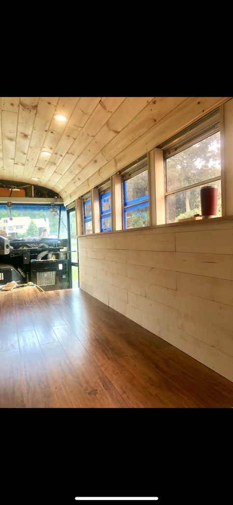 Repurposed School Bus, Short Skoolie Interior, School Bus Boutique, School Bus Transformation, School Bus Food Truck Conversion, Skoolie Deck Ideas, Short School Bus Conversion Interiors, Rv Bus Interior, Renovated School Bus Tiny House