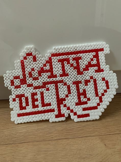 Iron on beads idea, logo from artist called Lana del rey Lana Del Rey Perler Beads, Lana Del Rey Crafts, Lana Del Rey Logo, Melty Bead Designs, Lana Del Rey Albums, Idea Logo, Pixel Beads, Perler Ideas, Fuse Bead Patterns