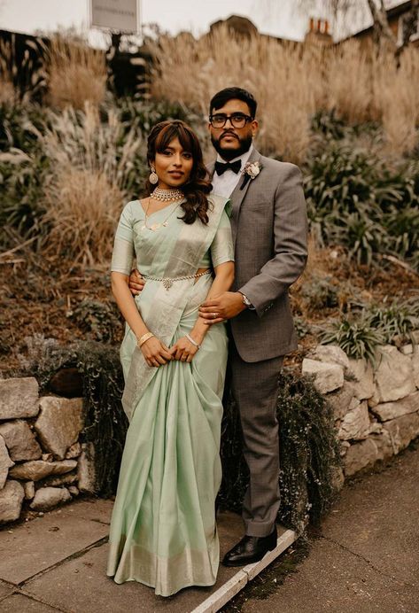 Bride in mint green traditional saree with gold jewellery with groom in grey suit and black bow tie for hotel wedding in London | city wedding Green Indian Wedding Dress, Green Indian Wedding, Combination Dresses, Mint Green Dress, Reception Look, Couple Dress, Groomsmen Outfits, Green Lehenga, Black Bow Tie