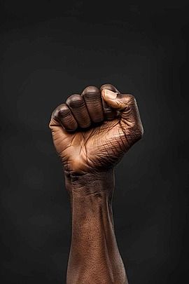 the hand raised with closed fist black power protest and revolution gesture lives matter Backgroun Black Power Wallpaper, Revolution Wallpaper, Black Power Movement, Garnet Steven, God Hand, Afro Comb, Garnet Steven Universe, Modern Tv Unit Designs, Hand Raised