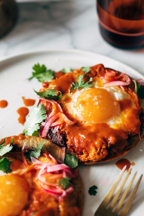 We're making Red Chile Tostadas with Eggs! We're talking creamy, crunchy, drippy, and tangy - the absolute perfect flavor combination. #tostada #egg #easyrecipe Red Chile Tostadas With Eggs, Breakfast Tostada Recipes, Breakfast Tostada, Enchiladas Corn Tortillas, Tostada Recipes, Red Chile, Pickled Red Onions, Pickled Onions, Enchilada Sauce