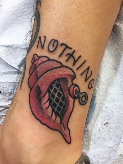 The Magic Conch Cast Iron Tattoos Orlando FL #tattoos #tattoo #beauty Magic Conch Shell Tattoo, Tremors Tattoo, Traditional Spongebob Tattoo, Castaway Tattoo, American Traditional Tattoos Funny, Traditional Tattoos Funny, Funny American Traditional Tattoo, Funny Traditional Tattoos, American Dad Tattoo