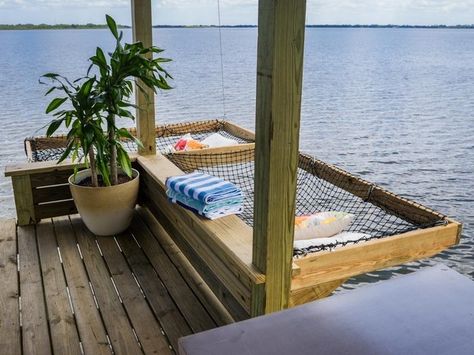 A freaking DOCK HAMMOCK. | 19 Things You'll Definitely Want For The Lake This Summer Lake Deck Ideas Boat Dock, How To Build A Dock On A Lake, Waterfront Dock Ideas, Backyard Dock Lake, Lakeside Dock Ideas, Water Dock Ideas, Deck On Lake House, Lake House Outdoor Living, Lake House Essentials Summer