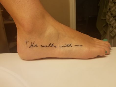 And He Walks With Me Tattoo, He Is With Me Tattoo, He Walks With Me Foot Tattoo, Side Foot Tattoos For Women, Cute Foot Tattoos For Women, He Walks With Me Tattoo, Walk By Faith Foot Tattoo, Faith Foot Tattoos, He Walks With Me