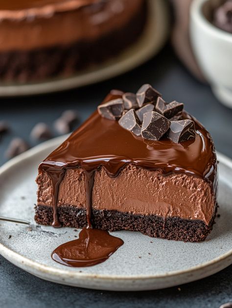 Chocolate Cheesecake 🍫   🍫 𝗜𝗻𝗴𝗿𝗲𝗱𝗶𝗲𝗻𝘁𝘀 🍫 For the Chocolate Cake Layers: 1 cup (130g) all-purpose flour 1 cup (207g) sugar 6 tbsp (43g) natural unsweetened cocoa powder 1 tsp baking soda 1/4 tsp baking powder 1/2 tsp salt 1/2 cup (120ml) milk 1/4 cup (60ml) vegetable oil 1/2 tsp vanilla extract 1 large egg 1/2 cup (120ml) hot water For the Chocolate Cheesecake: 24 oz (678g) cream cheese, room temperature 1 cup (207g) sugar 1/2 cup (57g) natural unsweetened cocoa powder Chocolate Cheesecake Aesthetic, Cheesecake Aesthetic, Chocolate Cake Layers, Dessert Quick, Cheesecake Ingredients, Korea Food, Food Pic, Unsweetened Cocoa Powder, Cake Layers