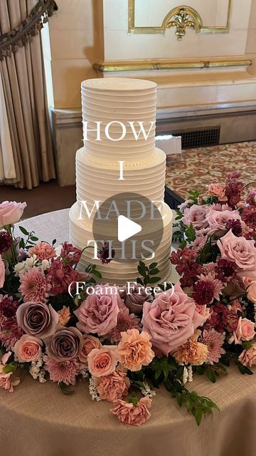 Winnipeg Wedding Florist on Instagram: "I LOVE THE CAKE MEADOW TREND. It’s so beautiful, and if you’re investing in a wedding cake, then why not make it more of a design focal point?   One of the best things about the cake meadow is that we’re not inserting flowers into your cake. While we’re really cautious to use non-toxic flowers, if you’re doing a cake meadow then you can use whatever flowers you want. It also means that the work of art your baker created isn’t destroyed by tons of little stem holes!   It’s really easy to do these foam-free (and please, please don’t put floral foam anywhere near something you’re going to eat! That stuff is toxic).   We simply measured our space according to the size of the cake, lined up a semi-circle of small dishes with flower frogs in them, and tuck Floral Base For Wedding Cake, Flower Cake Arrangement, Cake Flower Arrangement, Flower Cascade Cake, Wedding Cake Meadow Flowers, Foam Cake, Cake Flowers Wedding, Cake Meadow Flowers, Cake With Real Flowers