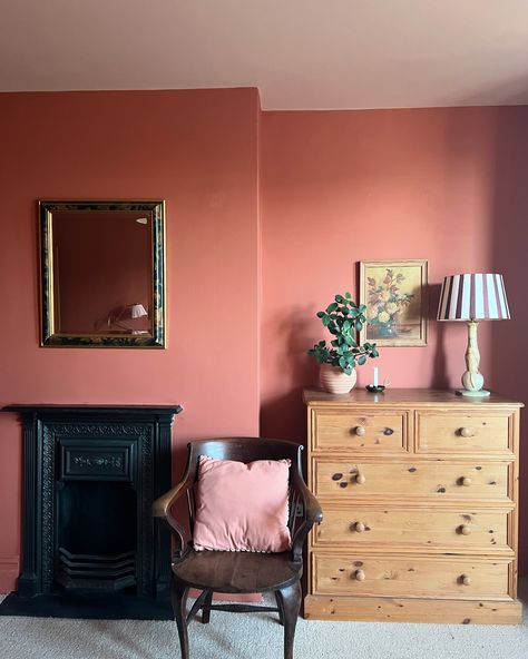 1 Cosy Bedroom Corner 🕯️ ✨- in 4 ways! Which is your favourite? Although this bedroom was only decorated just over a year ago this shows how much I like to shift furniture around! But really this post is to hail the impact of this beautiful warm terracotta paint colour on this previously greyish north facing room! Captured in different seasons and lights - this room still glows! Have you got a paint colour that never fails to evoke warmth and cosiness? I also think this is me slowly easing ... Red Paint Bedroom, Terra Cotta Room, North Facing Bedroom, North Facing Room, Terracotta Interior Design, Terra Cotta Paint Color, Terracotta Bedroom, Terracotta Paint, Vintage Core