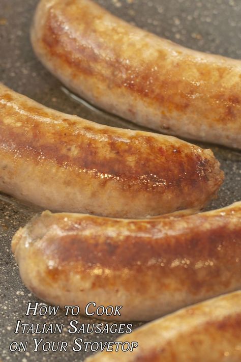 A closeup image of Italian sausages frying in a pan. Cooking Italian Sausage On Stove, How To Cook Sweet Italian Sausage, How To Cook Italian Sausage Links, How To Cook Sausage On Stove, How To Cook Italian Sausage On Stove, How To Cook Italian Sausage, How To Make Italian Sausage, Fried Italian Sausage, Recipes With Italian Sausage Links